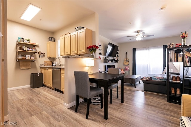 6955 N Durango Dr Unit 2081, Las Vegas, NV 89149 - dining space with light wood-style floors, ceiling fan, and baseboards
