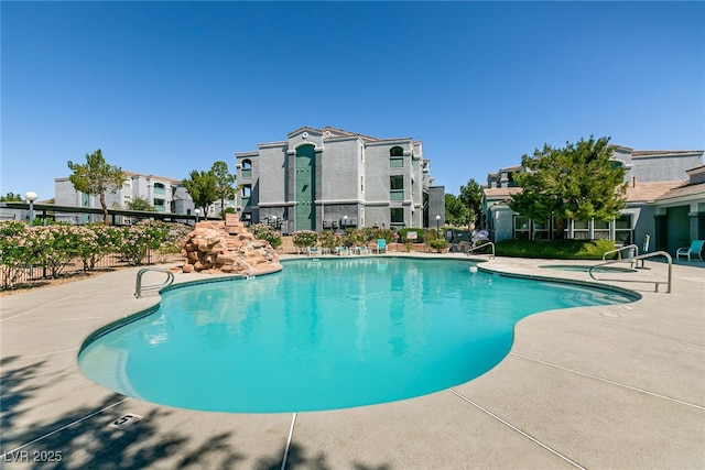 6955 N Durango Dr Unit 2081, Las Vegas, NV 89149 - community pool featuring a patio