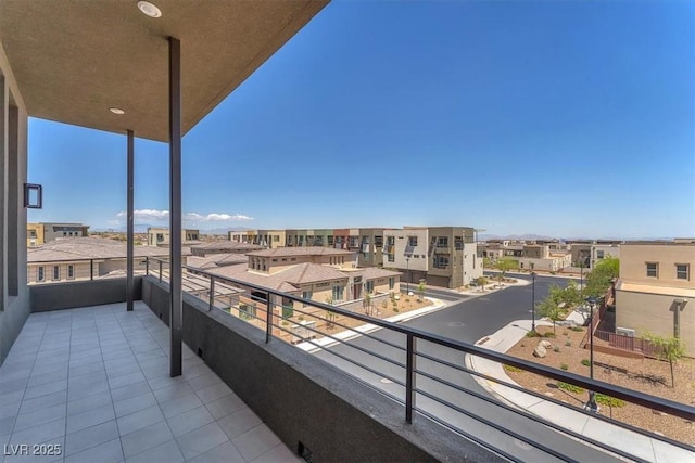 balcony featuring a residential view
