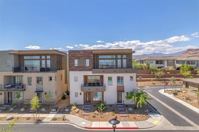 view of building exterior featuring a mountain view