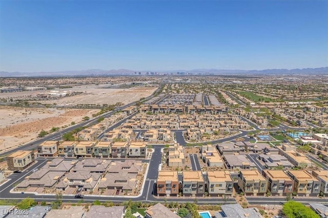 aerial perspective of suburban area featuring mountains