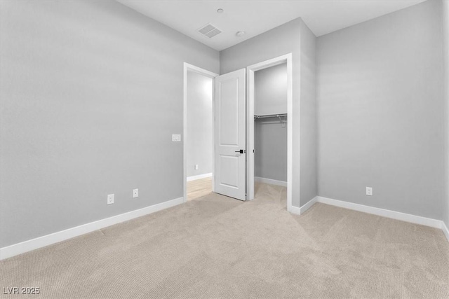 11707 Hatchling Ave, Las Vegas, NV 89138 - unfurnished bedroom featuring light colored carpet, baseboards, and a closet