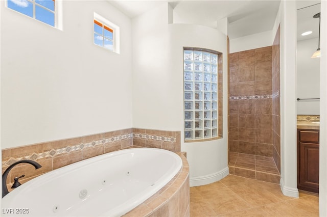 1252 Casa Palermo Cir, Henderson, NV 89011 - full bath with a tub with jets, walk in shower, vanity, and tile patterned flooring