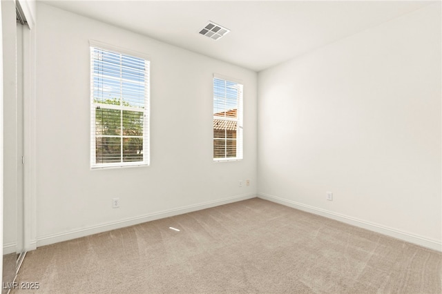 1252 Casa Palermo Cir, Henderson, NV 89011 - spare room featuring light colored carpet and baseboards