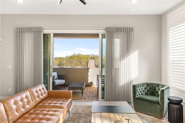 living room with tile patterned floors and recessed lighting