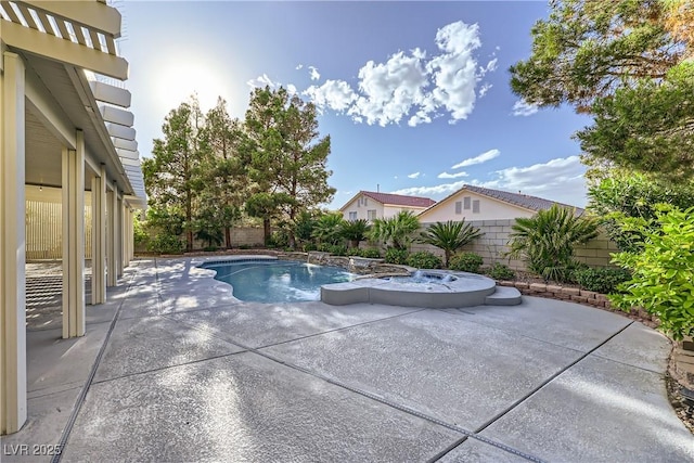 386 Wiseton Ave, Las Vegas, NV 89183 - view of pool with a patio area, a fenced backyard, and a pool with connected hot tub