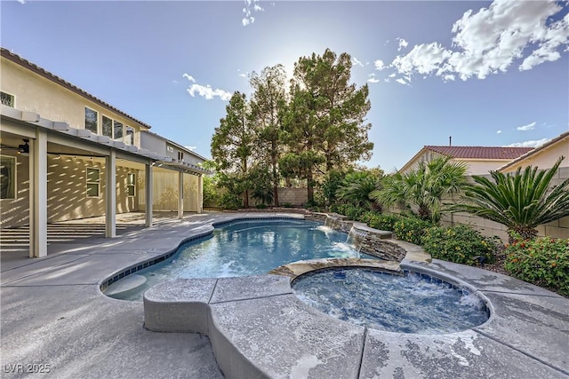 386 Wiseton Ave, Las Vegas, NV 89183 - view of swimming pool featuring a patio area, a fenced backyard, and a pool with connected hot tub