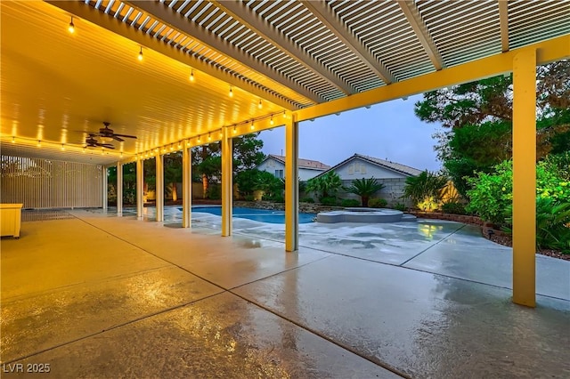 386 Wiseton Ave, Las Vegas, NV 89183 - view of patio featuring ceiling fan, a pool with connected hot tub, and fence