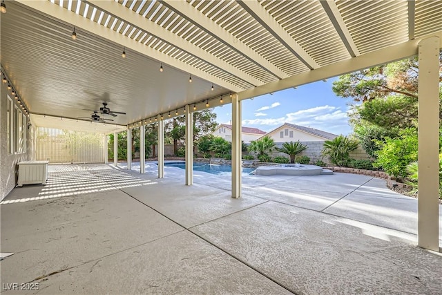386 Wiseton Ave, Las Vegas, NV 89183 - view of patio featuring ceiling fan, a fenced backyard, and an in-ground hot tub