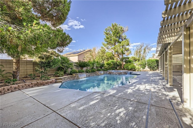 386 Wiseton Ave, Las Vegas, NV 89183 - view of swimming pool featuring a patio area, an in-ground hot tub, and a fenced backyard