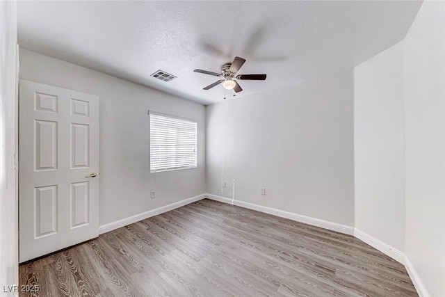 11028 Meadow Leaf Ave, Las Vegas, NV 89144 - empty room featuring ceiling fan, wood finished floors, and baseboards