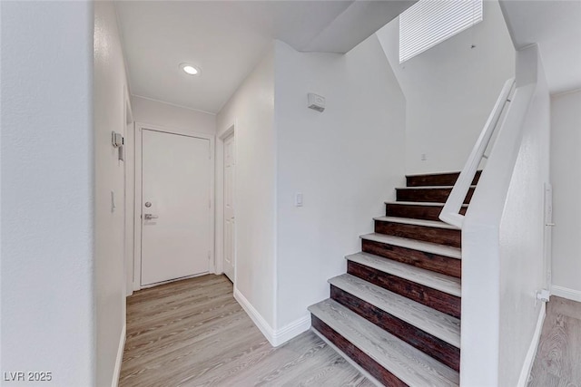 11028 Meadow Leaf Ave, Las Vegas, NV 89144 - stairs featuring wood finished floors, baseboards, and recessed lighting
