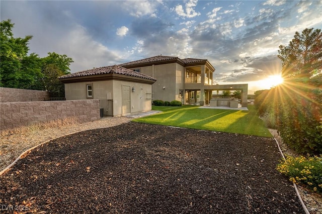 2900 Valvent Ct, Henderson, NV 89044 - back of property with a balcony, a patio, stucco siding, and a tile roof