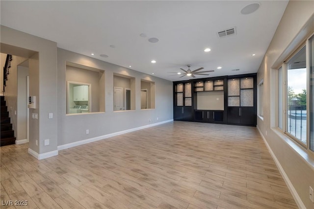 2900 Valvent Ct, Henderson, NV 89044 - unfurnished living room with ceiling fan, stairs, light wood-type flooring, baseboards, and recessed lighting