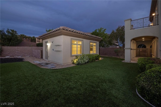 2900 Valvent Ct, Henderson, NV 89044 - view of home's exterior featuring a balcony, stucco siding, and a tile roof