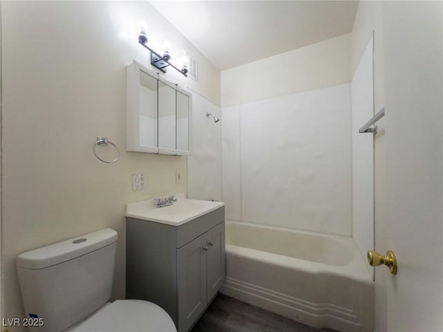 26 E Atlantic Ave, Henderson, NV 89015 - bathroom with toilet, shower / bathtub combination, vanity, and wood finished floors