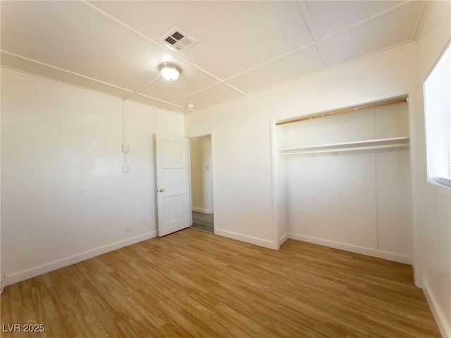 26 E Atlantic Ave, Henderson, NV 89015 - unfurnished bedroom with wood finished floors, a closet, and baseboards