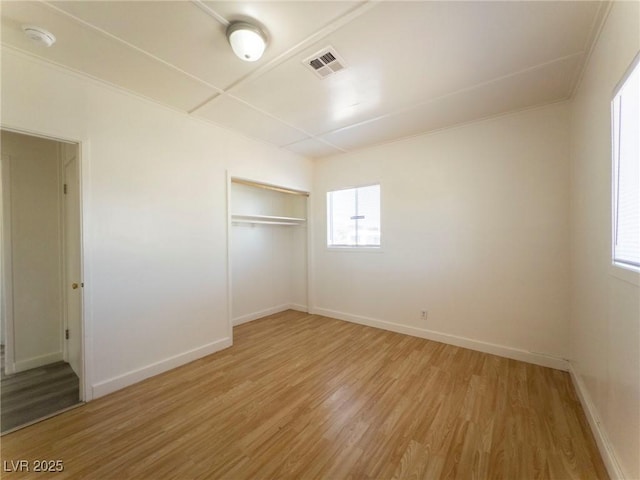 26 E Atlantic Ave, Henderson, NV 89015 - unfurnished bedroom featuring light wood-style flooring, baseboards, and a closet