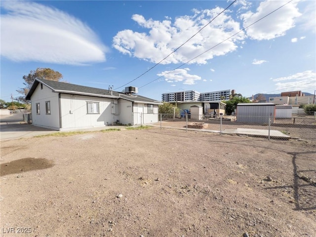 26 E Atlantic Ave, Henderson, NV 89015 - back of house with fence and central air condition unit