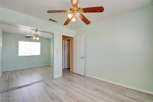 8370 Lost Lake Ct, Las Vegas, NV 89147 - spare room featuring wood finished floors, baseboards, and ceiling fan