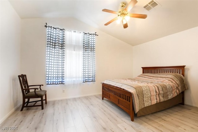 8370 Lost Lake Ct, Las Vegas, NV 89147 - bedroom with lofted ceiling, wood finished floors, ceiling fan, and baseboards