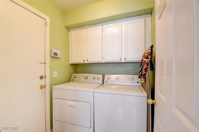 8370 Lost Lake Ct, Las Vegas, NV 89147 - laundry room featuring washer and clothes dryer and cabinet space