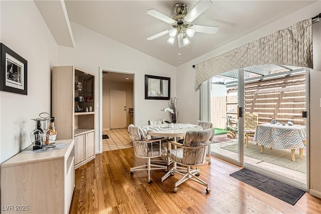 5401 Bugle Way Unit 103, Las Vegas, NV 89108 - dining area featuring vaulted ceiling, light wood-style floors, and ceiling fan