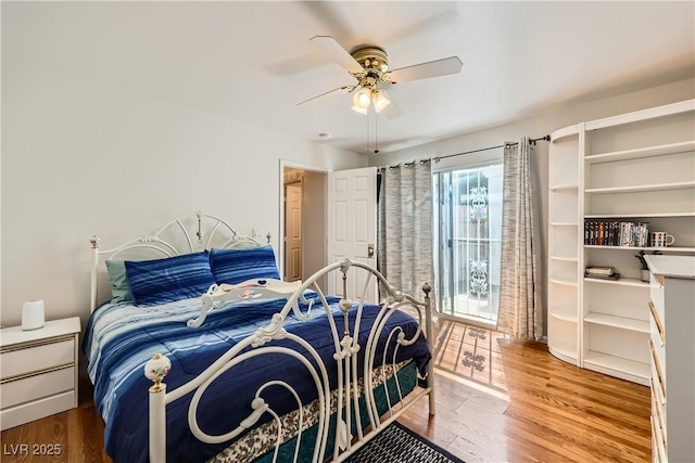 5401 Bugle Way Unit 103, Las Vegas, NV 89108 - bedroom featuring wood finished floors and a ceiling fan