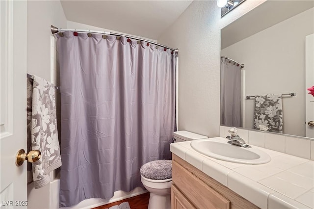 5401 Bugle Way Unit 103, Las Vegas, NV 89108 - bathroom featuring toilet, vanity, and shower / bath combo