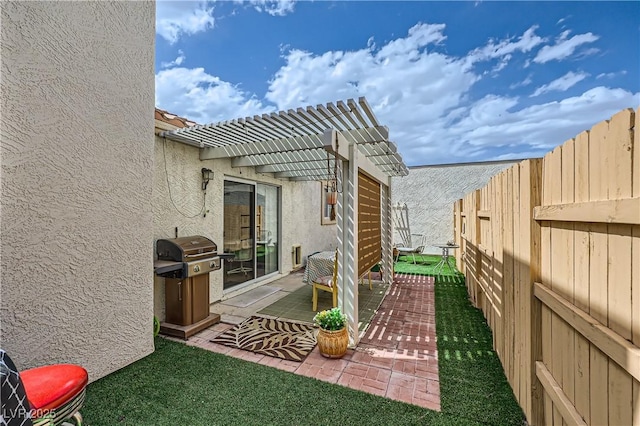 5401 Bugle Way Unit 103, Las Vegas, NV 89108 - fenced backyard featuring a pergola