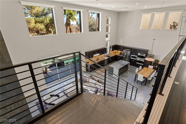 2672 Mystere Ct, Las Vegas, NV 89117 - living area with a towering ceiling and recessed lighting