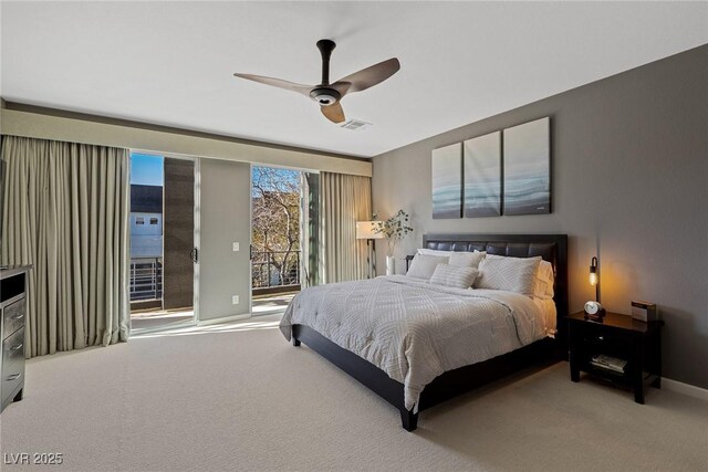 2672 Mystere Ct, Las Vegas, NV 89117 - carpeted bedroom with access to exterior and a ceiling fan