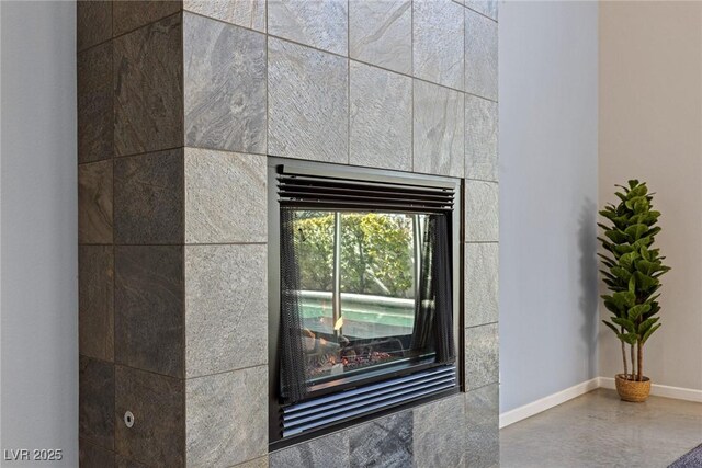 2672 Mystere Ct, Las Vegas, NV 89117 - detailed view of a fireplace and baseboards