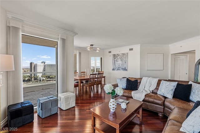 2777 Paradise Rd Unit 1105, Las Vegas, NV 89109 - living area with plenty of natural light, ornamental molding, and hardwood / wood-style flooring