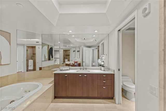 bathroom featuring a jetted tub, toilet, vanity, tile patterned flooring, and a shower