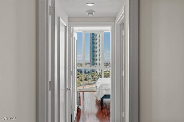 2777 Paradise Rd Unit 1105, Las Vegas, NV 89109 - hall with a view of city and dark wood finished floors