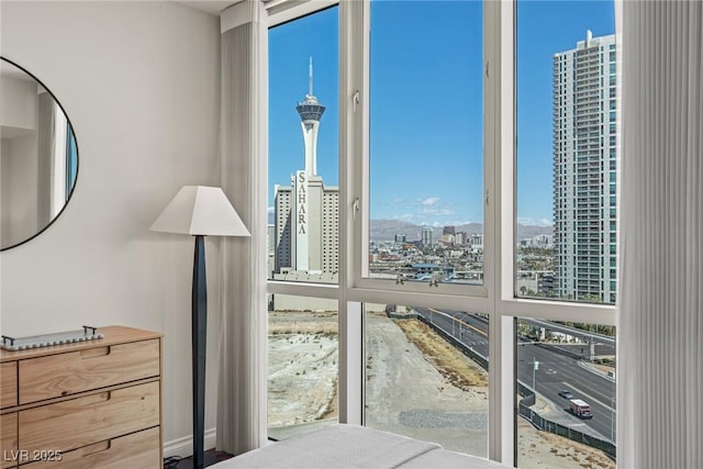 bedroom featuring a view of city
