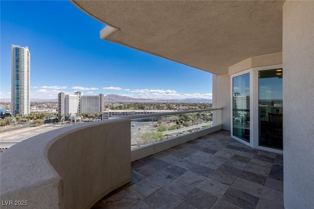 balcony featuring a mountain view