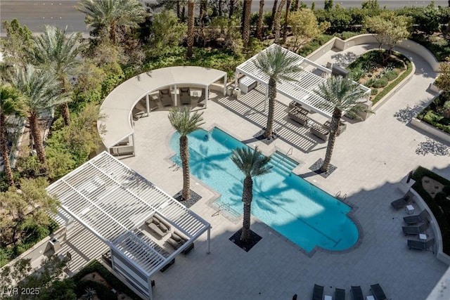 drone / aerial view of a pool
