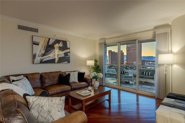 2777 Paradise Rd Unit 1105, Las Vegas, NV 89109 - living room featuring wood finished floors and ornamental molding