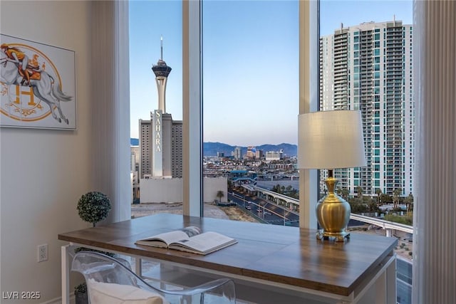 office featuring a view of city and a mountain view