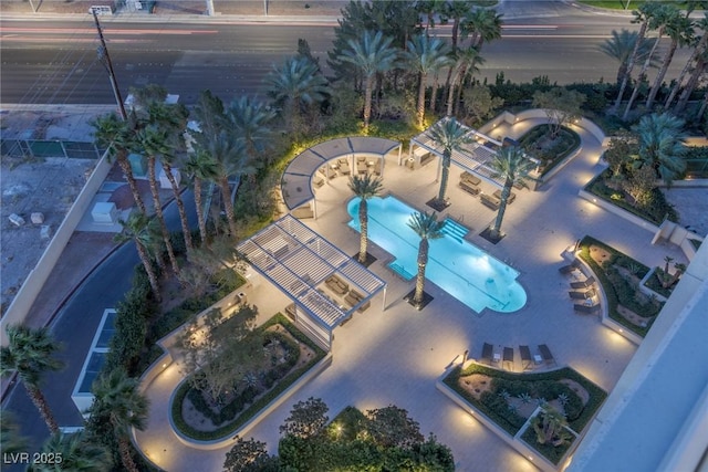 drone / aerial view of a pool