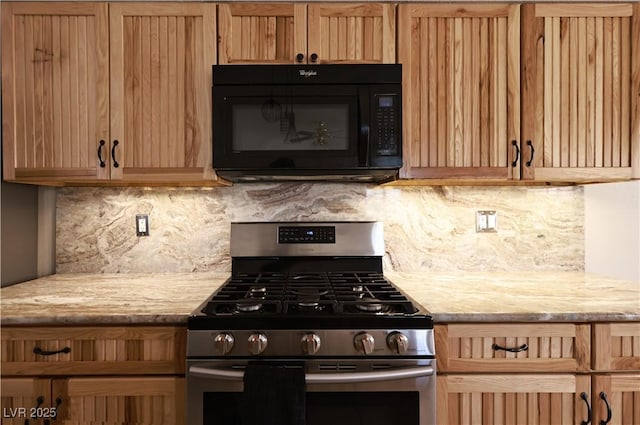 6016 Bungalow Bay St, Las Vegas, NV 89130 - kitchen featuring black microwave, stainless steel gas stove, and tasteful backsplash