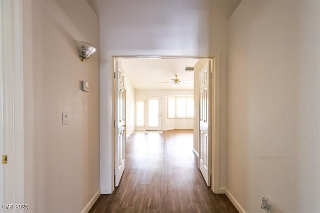 6016 Bungalow Bay St, Las Vegas, NV 89130 - corridor featuring baseboards and dark wood-style floors