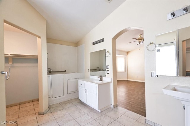 6016 Bungalow Bay St, Las Vegas, NV 89130 - full bathroom with a sink, ceiling fan, tile patterned floors, and a walk in closet