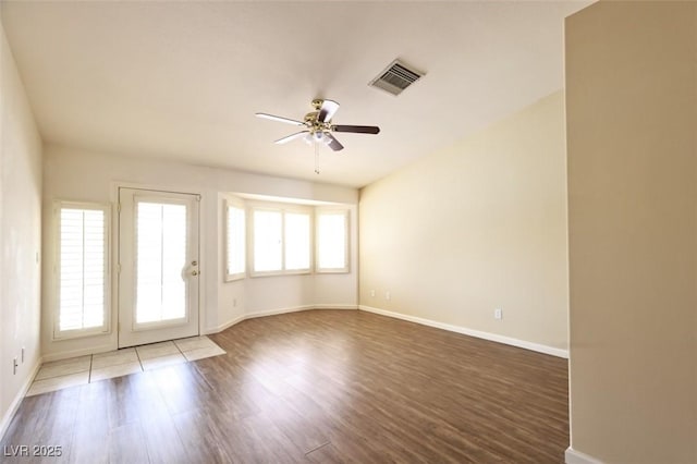6016 Bungalow Bay St, Las Vegas, NV 89130 - spare room with a ceiling fan, wood finished floors, and baseboards