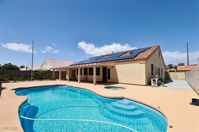 6016 Bungalow Bay St, Las Vegas, NV 89130 - view of swimming pool featuring a fenced backyard, a patio, and an in-ground hot tub