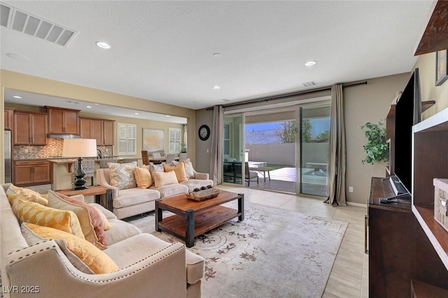 living room with recessed lighting