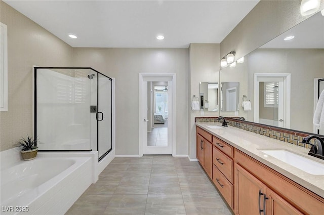 full bath with a shower stall, double vanity, a bath, tile patterned flooring, and tasteful backsplash