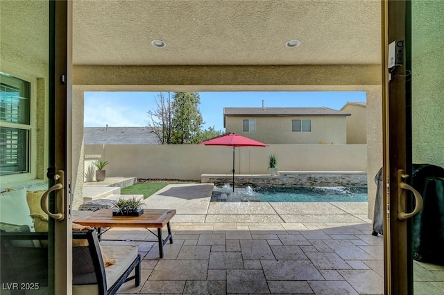 view of patio with a fenced backyard